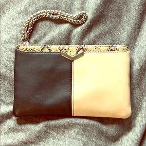 Black and cream wristlet from Express